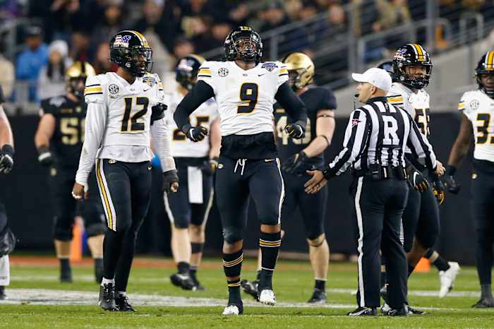 Dec 22, 2021; Fort Worth, Texas, USA; Missouri Tigers defensive lineman Isaiah McGuire (9) celebrates after a play against the Army Black Knights during the first quarter of the 2021 Armed Forces Bowl at Amon G. Carter Stadium. Mandatory Credit: Andrew Dieb-USA TODAY Sports